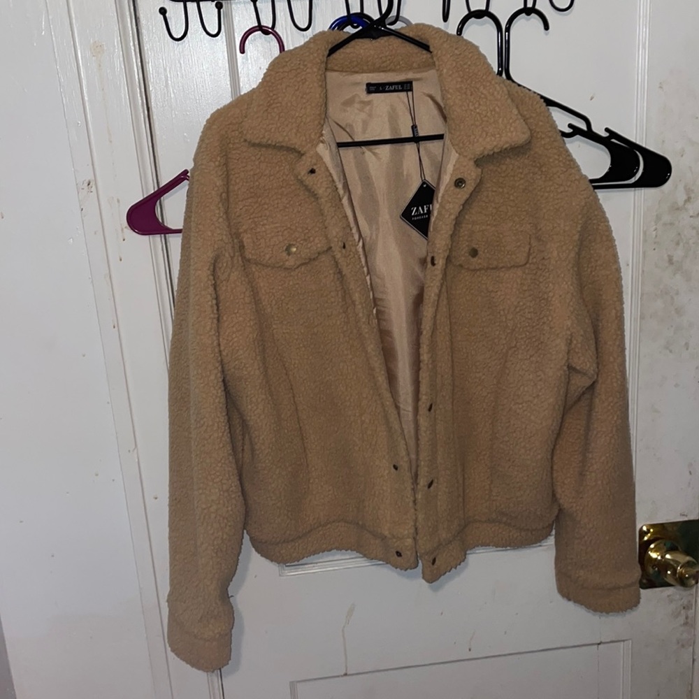 A faux fur jacket from Zaful. Size L (US 38) and never worn!